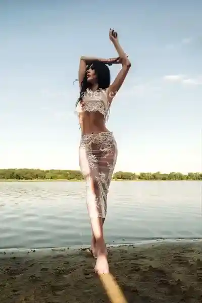 Hire Brunette Escort Rina to Indulge in Extraordinary Erotic Activities